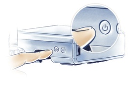 Appui sur le bouton d'alimentation au dos du Home Center Lite